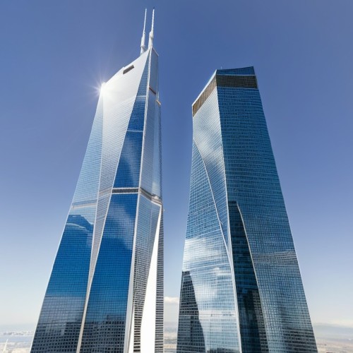 Modern Skyscraper with Glass Facade: A sleek, ultra-modern skyscraper with a fully glass facade reflecting the cityscape around it. The building&#039;s design features sharp angles and a slim silhouette, standing tall against the blue sky with neighboring skyscrapers.