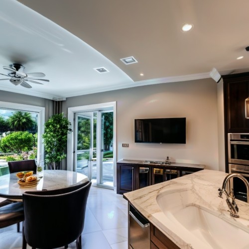 Elegant Kitchen with Island: A high-end kitchen featuring a large central island with marble countertops, stainless steel appliances, and custom cabinetry. The kitchen is decorated in a minimalist style with a neutral color palette, giving it a clean and sophisticated look.
